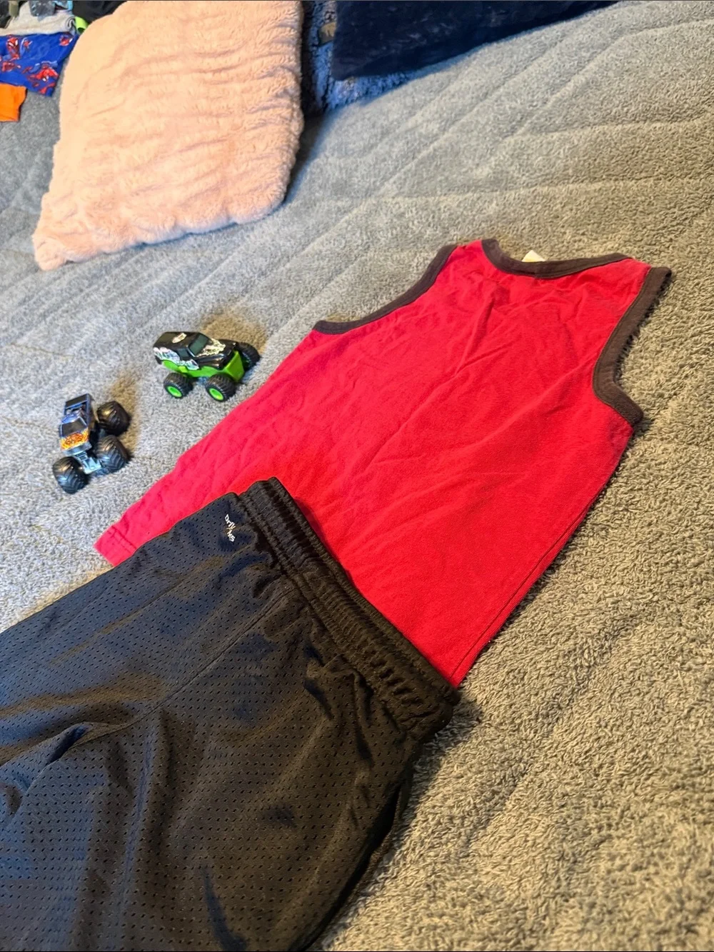 Red Shark Tank Top with Black Athletic Shorts